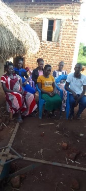 Batana at one of his savings group meetings.