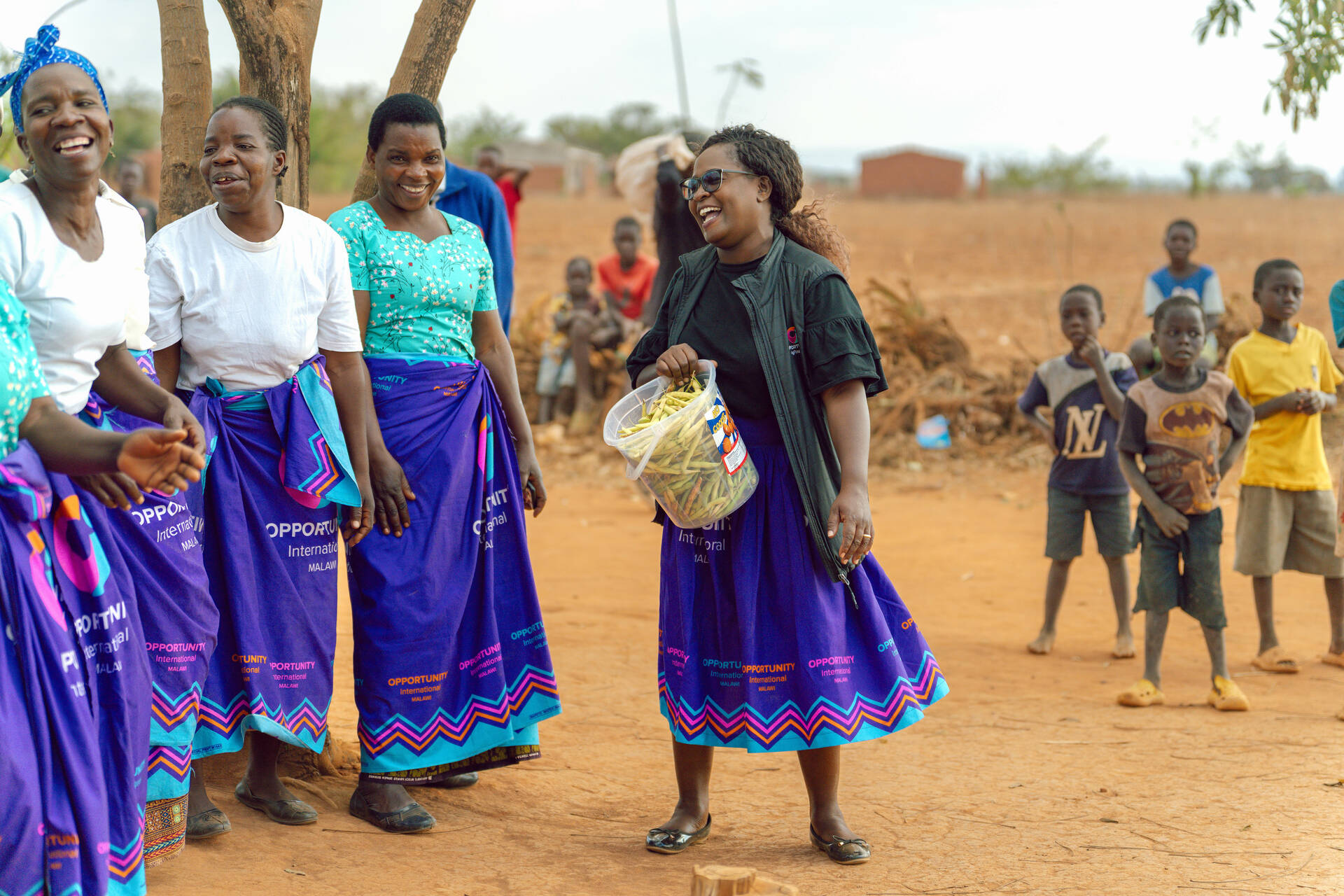 Members of the Nsauka Village Savings & Loan Association gather on August 19, 2025 in rural Lilongwe, Malawi. (Photo Credit: Kondwani Jere / Opportunity International)