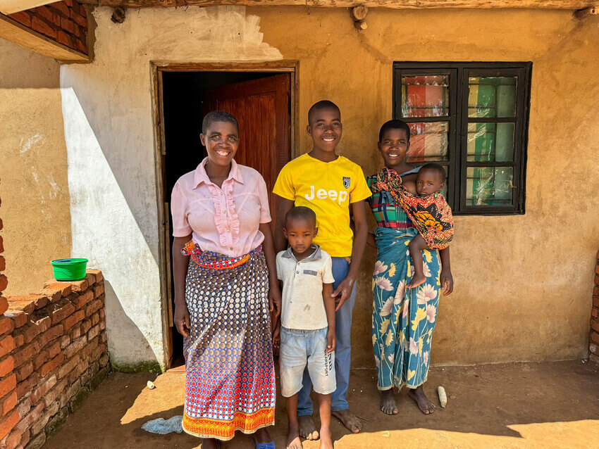 Rose, left, poses with her four children